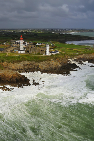 Fondo de pantalla Lighthouse on the North Sea 320x480