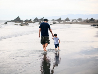 Father And Child Walking By Beach screenshot #1 320x240