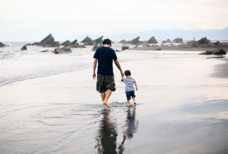 Father And Child Walking By Beach Background for Android, iPhone and iPad