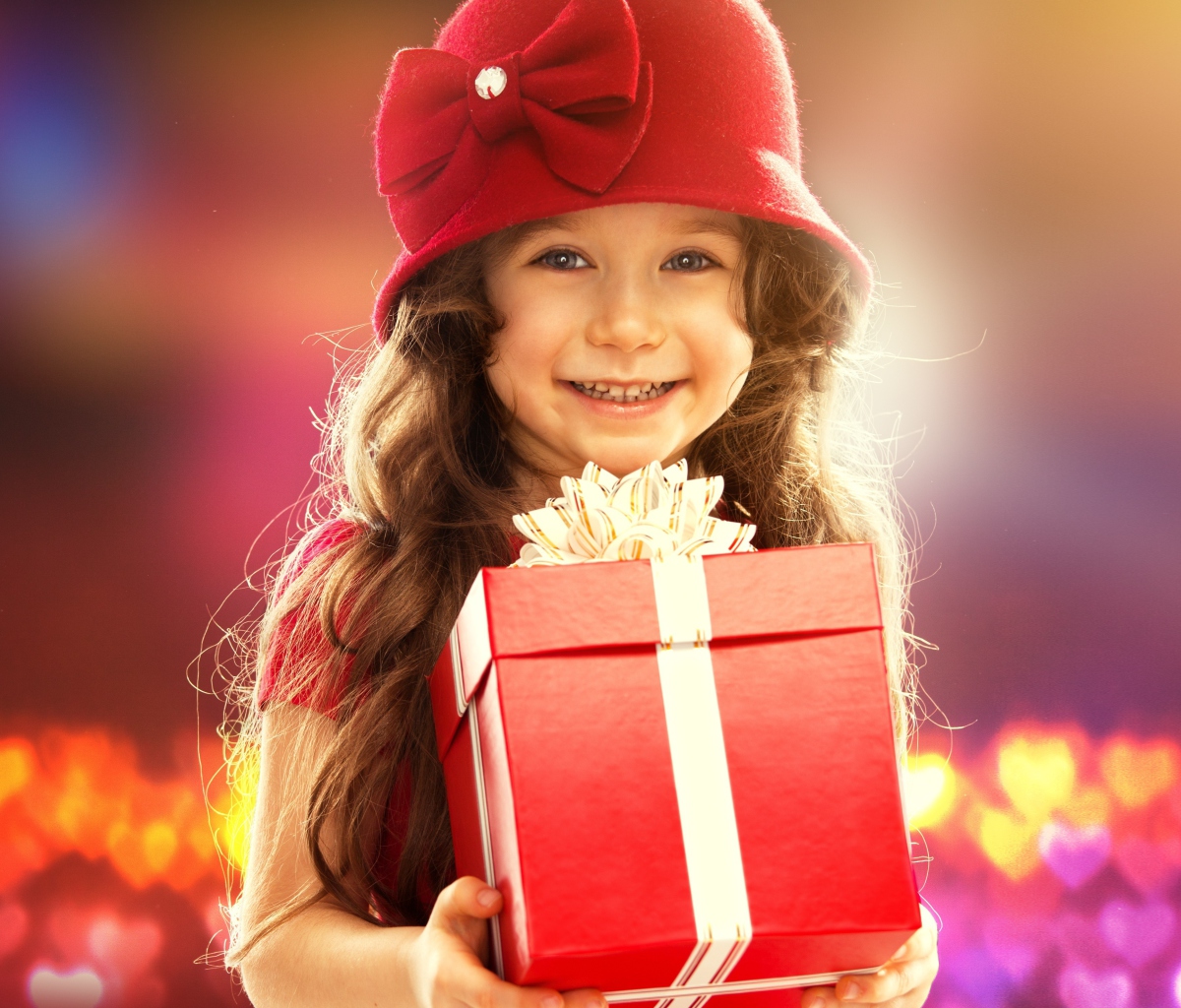 Happy Child With Present wallpaper 1200x1024