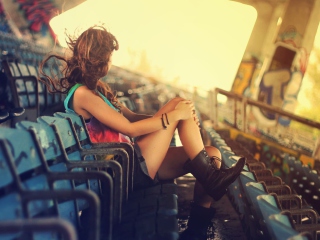 Das Girl Sitting In Stadium Wallpaper 320x240