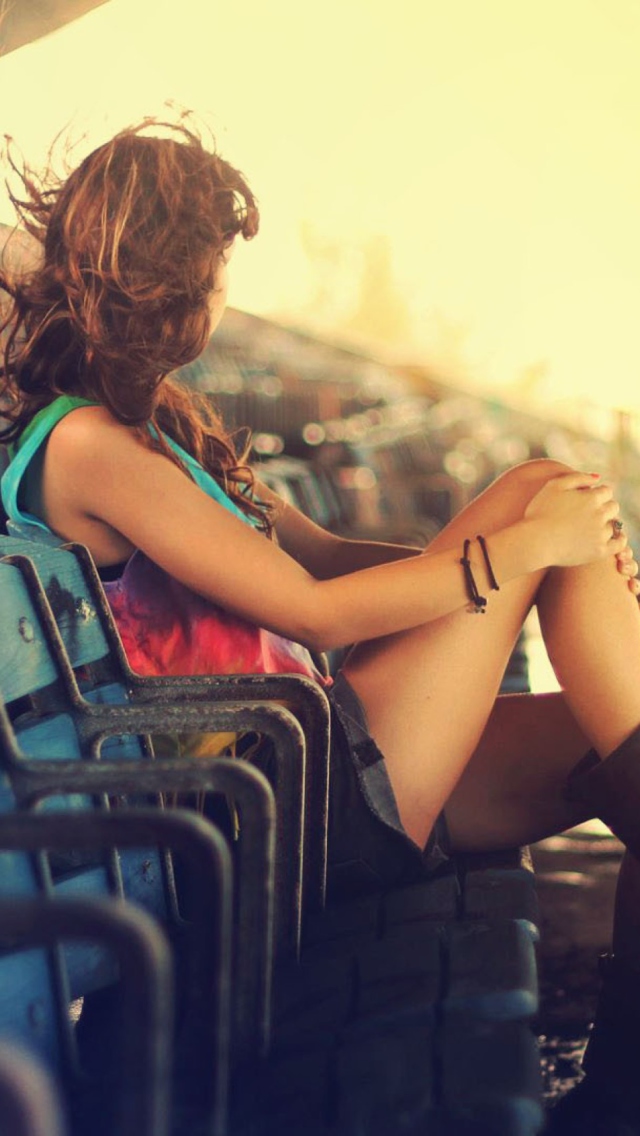 Girl Sitting In Stadium wallpaper 640x1136