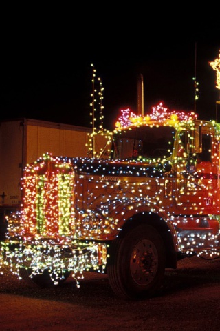 Fondo de pantalla Xmas Truck in Lights 320x480