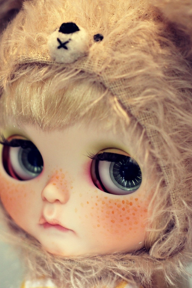Cute Doll With Freckles wallpaper 640x960