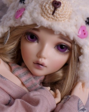 Screenshot №1 pro téma Beautiful Doll With Deep Purple Eyes 176x220