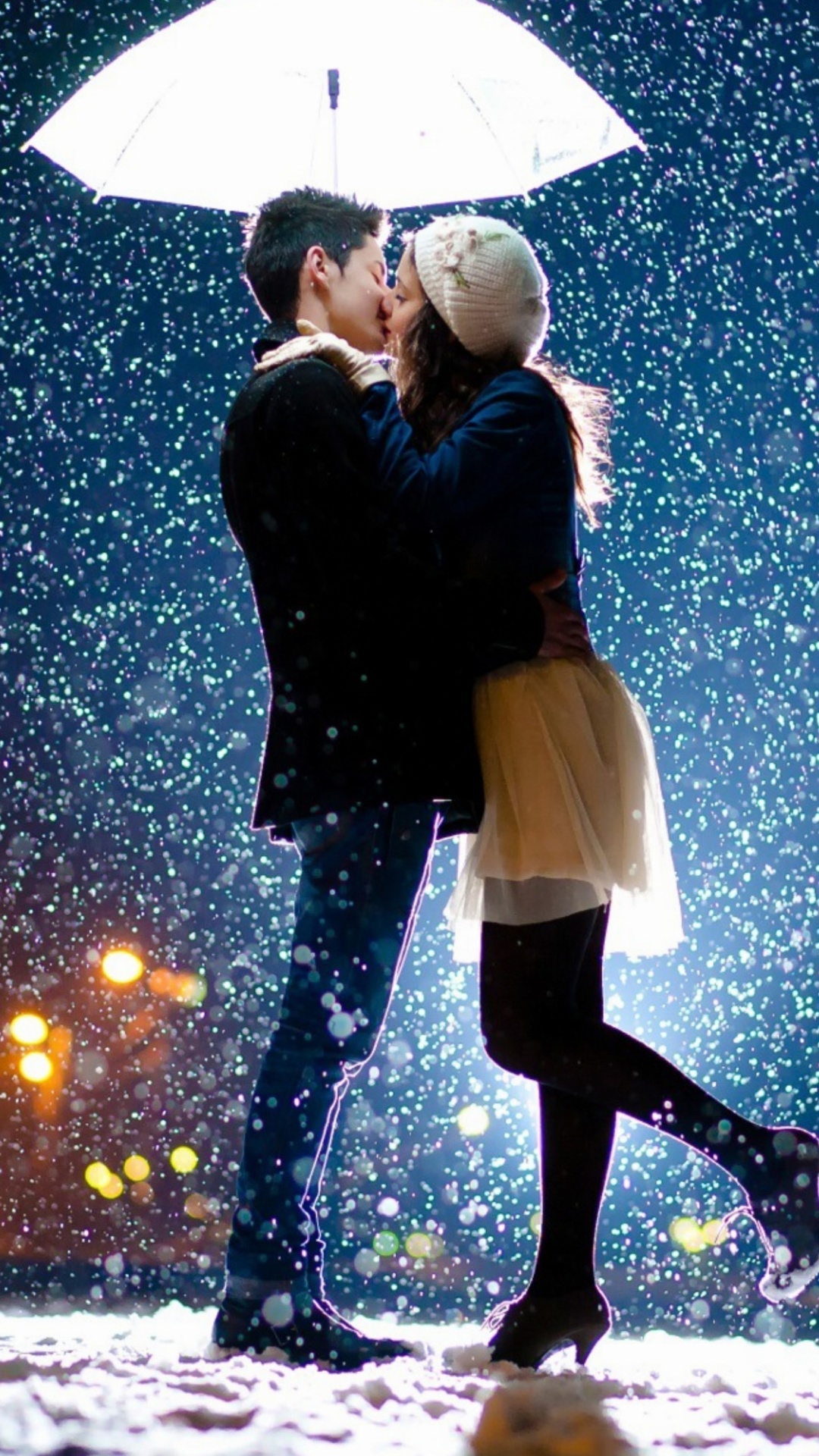 Fondo de pantalla Kissing under snow 1080x1920