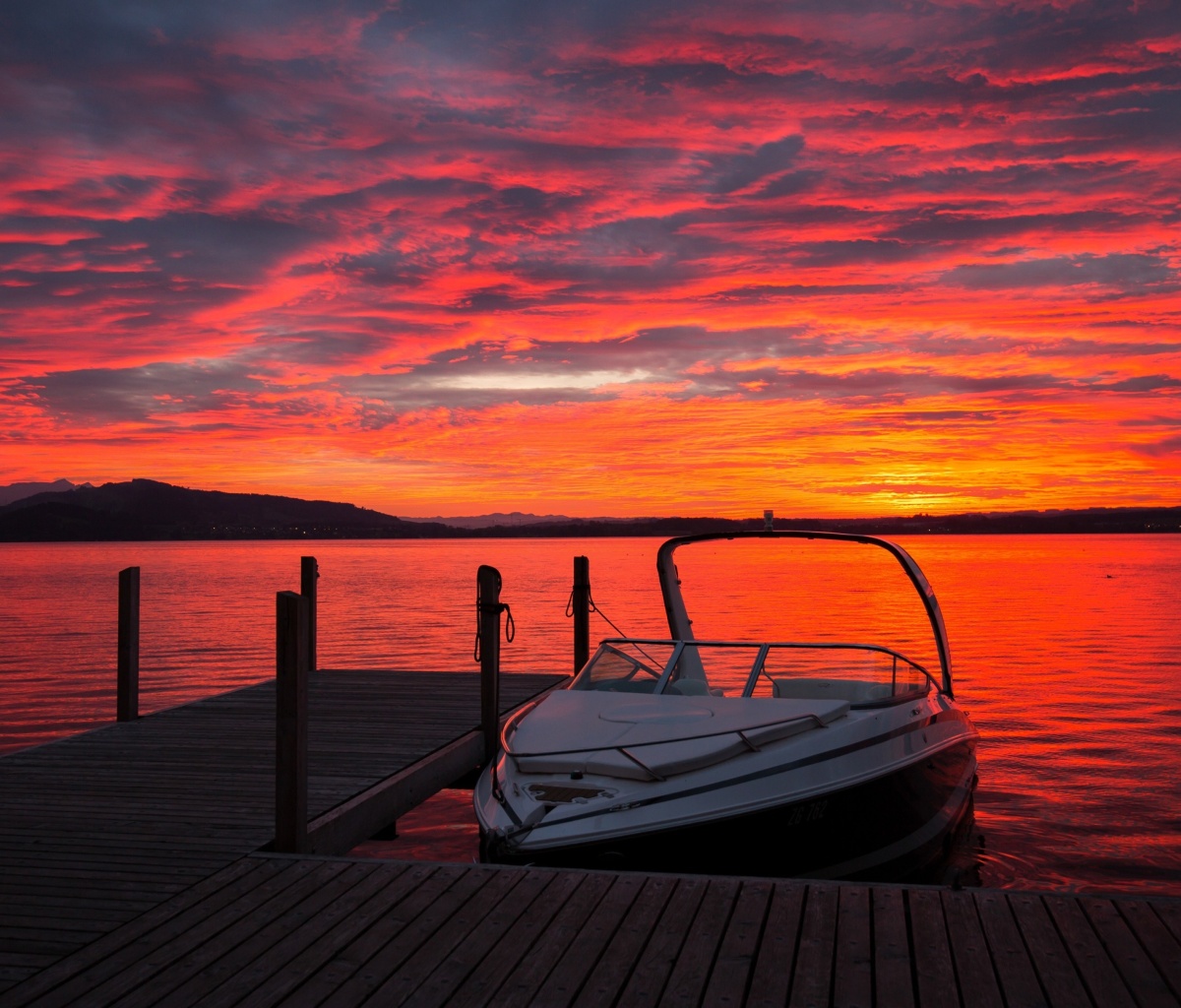 Sfondi Lake sunrise with boat 1200x1024