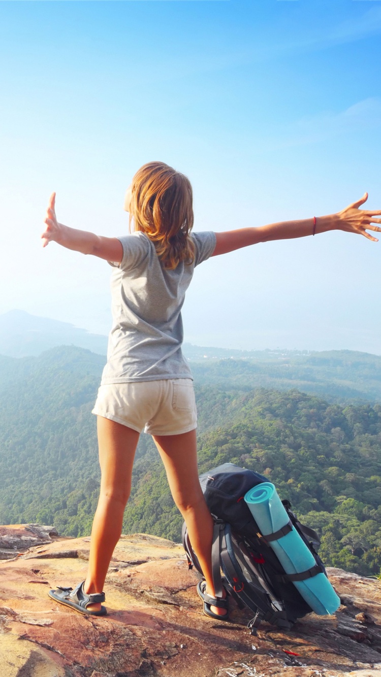 Backpacker tourist girl wallpaper 750x1334