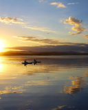 Screenshot №1 pro téma Two Boats Sailing In Calm Morning 128x160