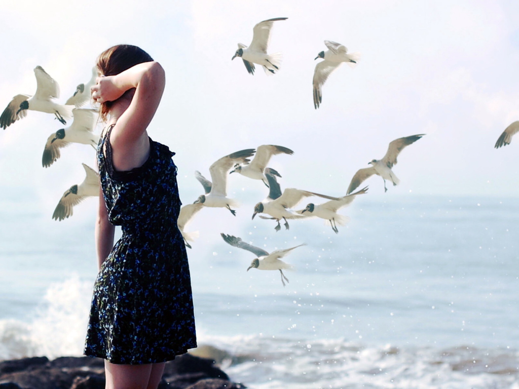 Girl On Sea Coast And Seagulls wallpaper 1024x768