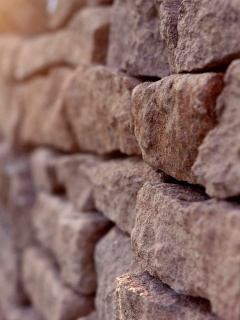 Fondo de pantalla Macro Brick Wall Closeup 240x320
