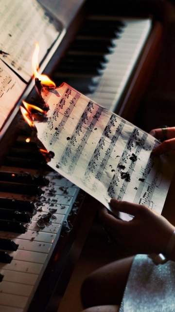 Das Sheet Music in Fire Wallpaper 360x640
