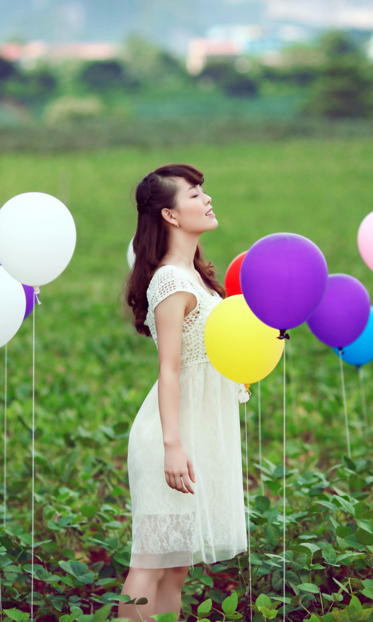 Fondo de pantalla Girl And Colorful Balloons 768x1280