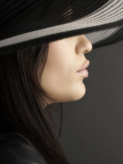 Обои Woman in Black Hat 240x320