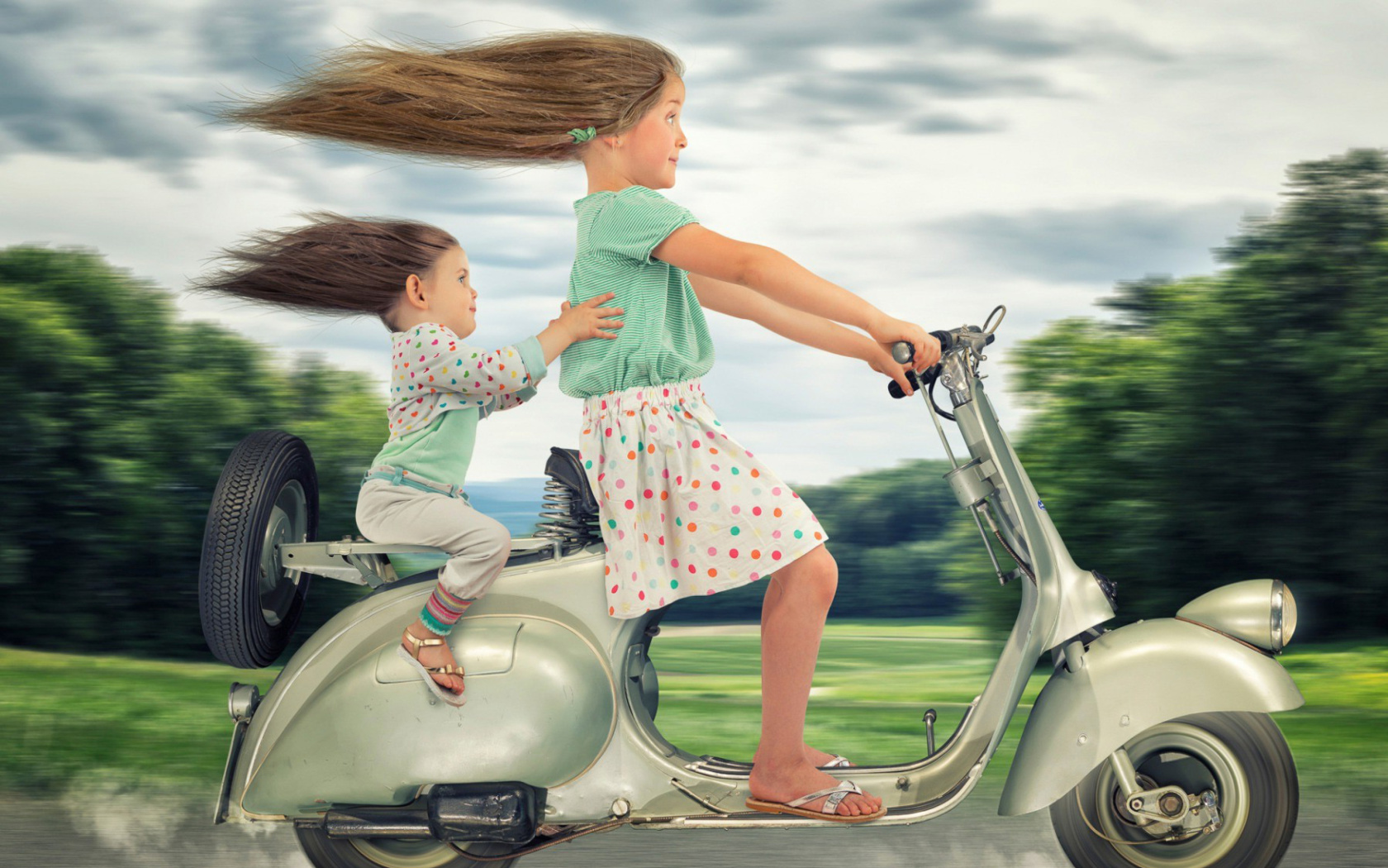 Funny kids on bike wallpaper 1680x1050