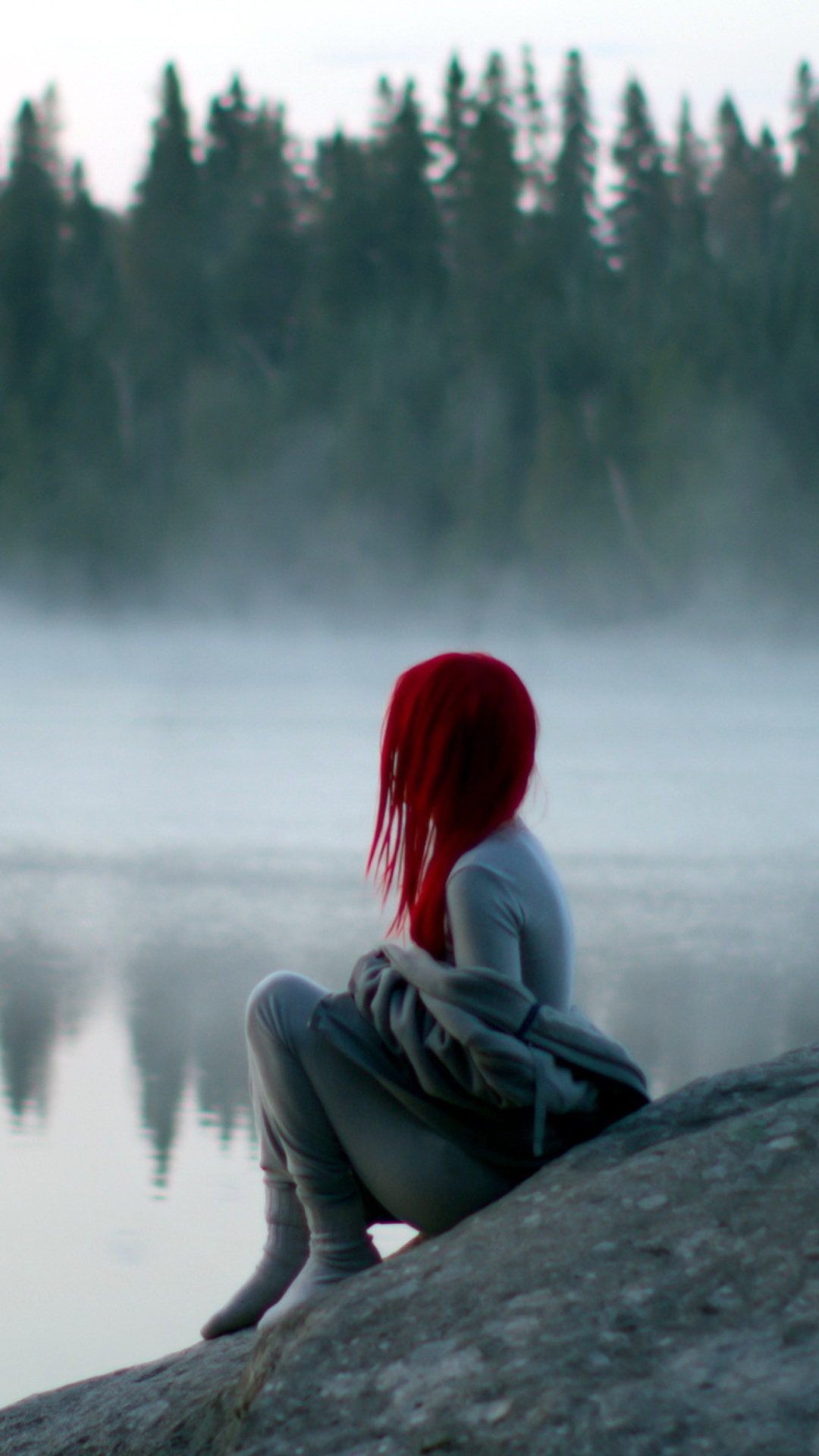 Fondo de pantalla Girl With Red Hair And Lake Fog 1080x1920