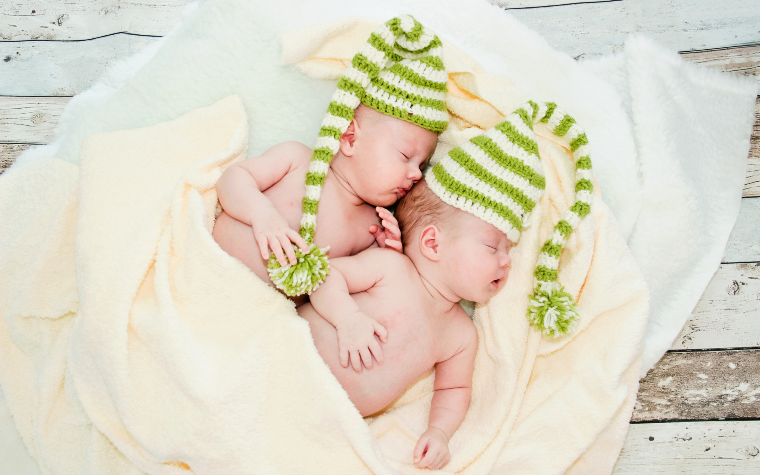 Cute Babies In Green Hats Sleeping wallpaper 2560x1600