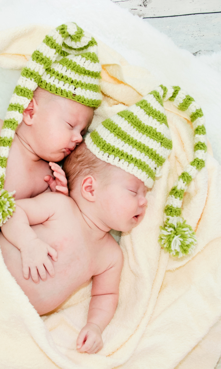Cute Babies In Green Hats Sleeping wallpaper 768x1280