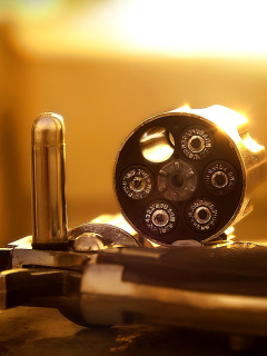 Das Revolver with Handgun Cartridges Wallpaper 240x320