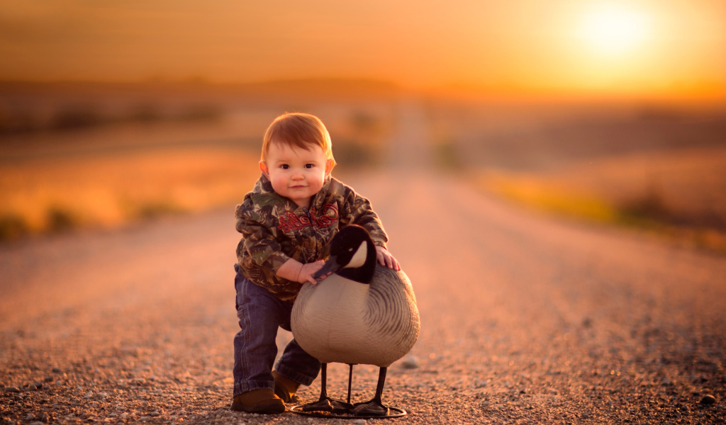 Kid and Duck wallpaper 1024x600