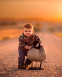 Kid and Duck wallpaper 128x160