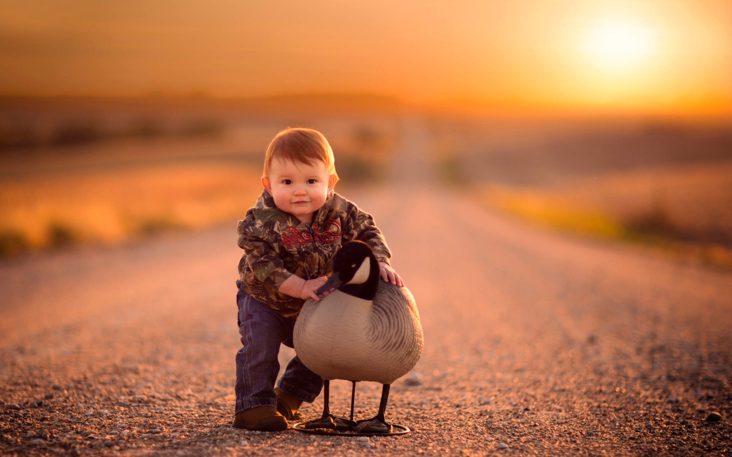 Kid and Duck wallpaper 2560x1600