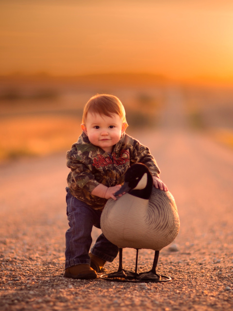 Kid and Duck wallpaper 480x640