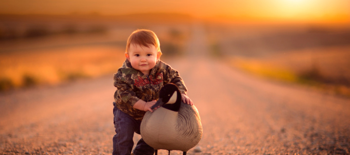 Kid and Duck wallpaper 720x320