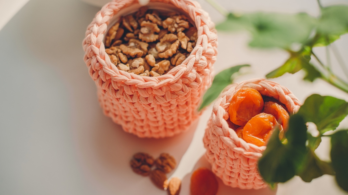 Обои Nuts and dried apricots 1366x768
