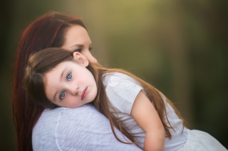 Mom And Daughter With Blue Eyes Background for Android, iPhone and iPad