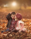 Das Boy and Girl in Autumn Garden Wallpaper 128x160