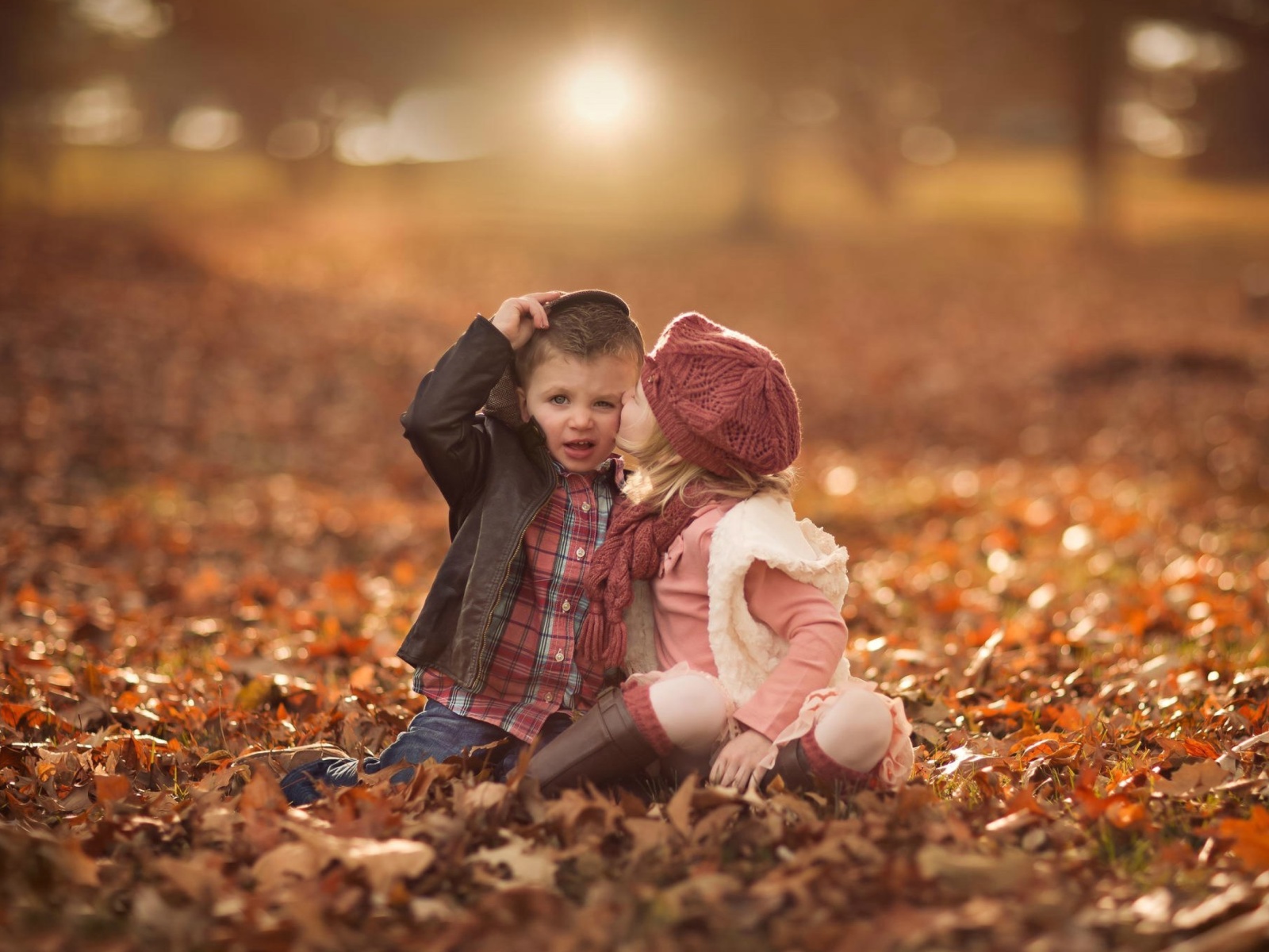 Boy and Girl in Autumn Garden wallpaper 1600x1200
