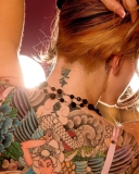 Обои Tattooed Girl's Back 128x160