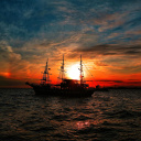Fondo de pantalla Ship in sunset 128x128