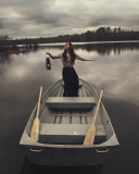 Обои Girl In Boat With Candle 128x160