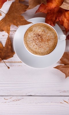 Das Cozy autumn morning with a cup of hot coffee Wallpaper 240x400