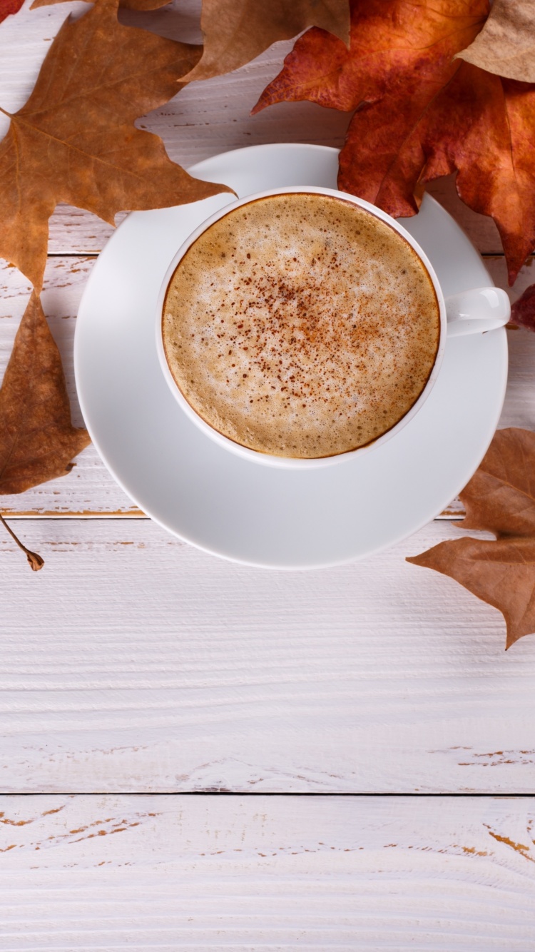 Das Cozy autumn morning with a cup of hot coffee Wallpaper 750x1334