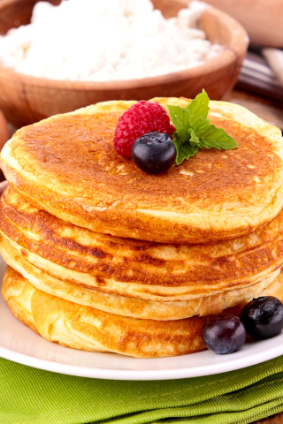 Pancakes with honey wallpaper 320x480