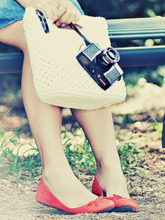 Girl With Camera Sitting On Bench screenshot #1 240x320