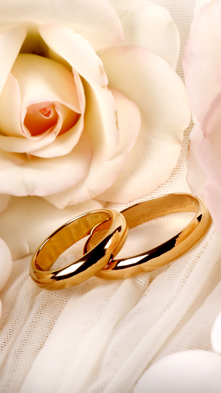 Обои Roses and Wedding Rings 750x1334
