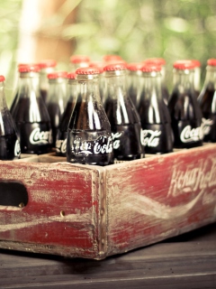 Sfondi Vintage Coca-Cola Bottles 240x320
