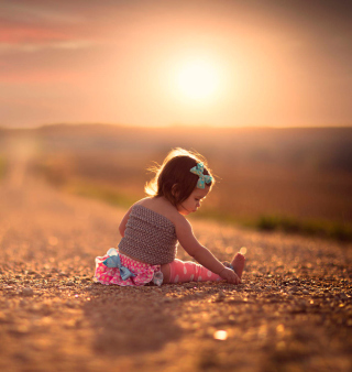 Child On Road At Sunset Wallpaper for 1024x1024