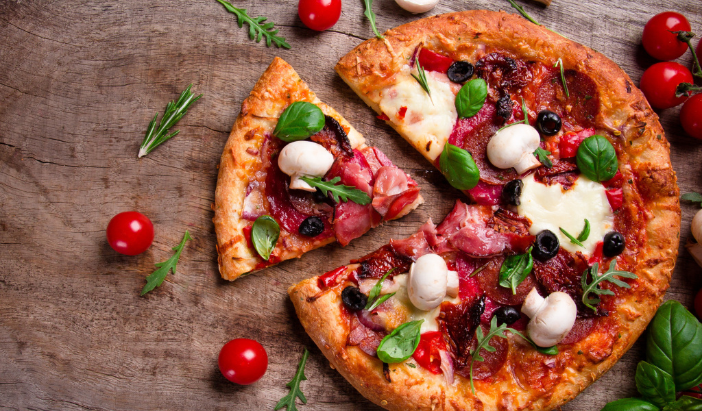 Pizza with mushrooms and olives wallpaper 1024x600