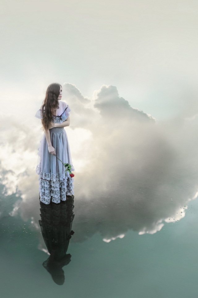 Fondo de pantalla Girl With Rose Standing On Sky 640x960