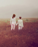 Two Girls Walking In The Field screenshot #1 128x160