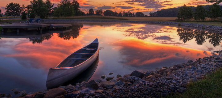 Sfondi Canoe At Sunset 720x320