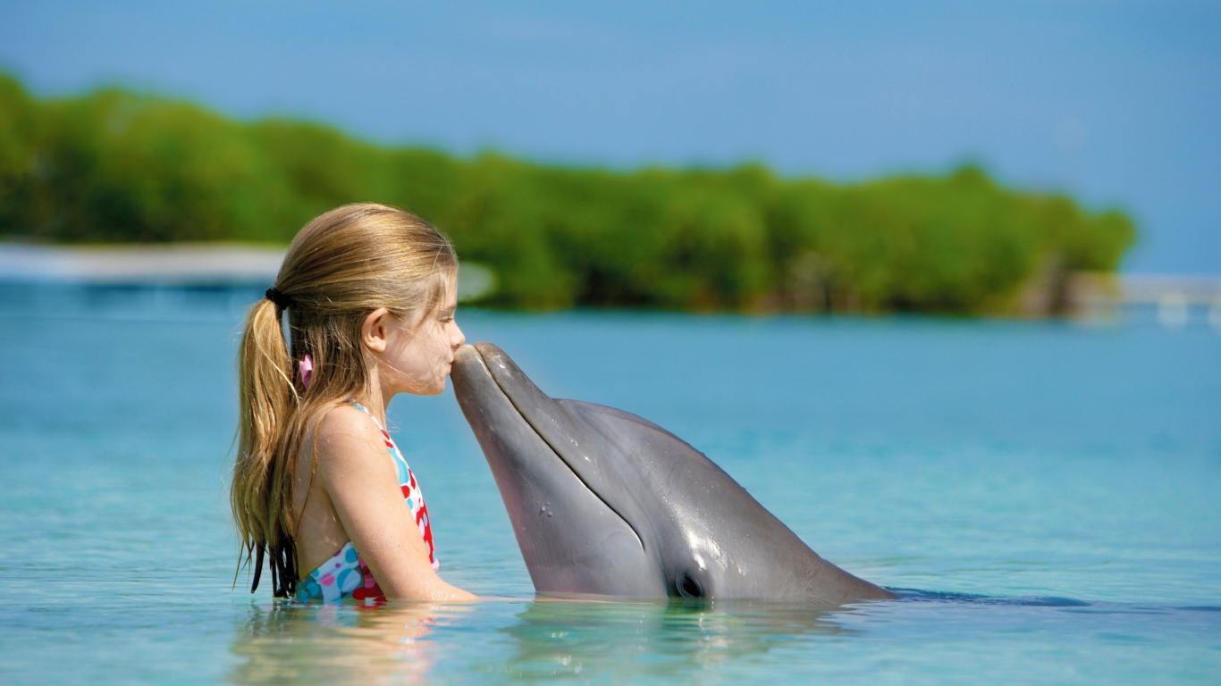 Friendship Between Girl And Dolphin screenshot #1 1366x768
