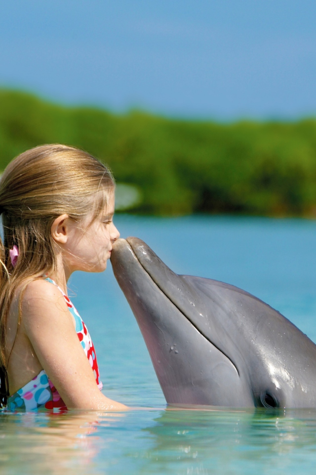 Friendship Between Girl And Dolphin wallpaper 640x960