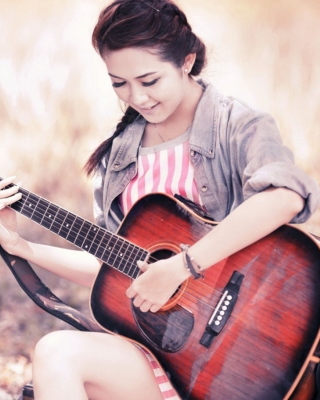 Kostenloses Chinese girl with guitar Wallpaper für iPhone 3G