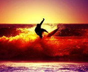 Fondo de pantalla Surfing At Sunset 176x144